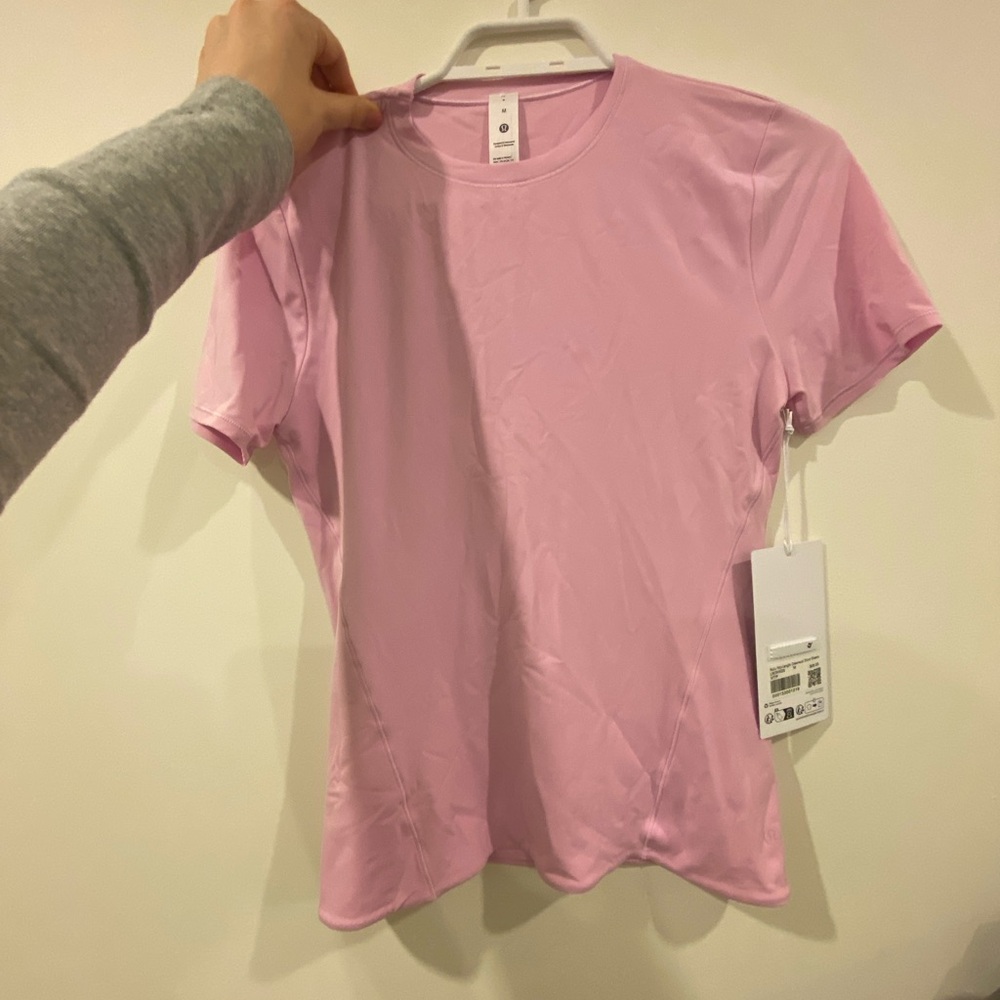 lululemon athletica nulu hip-length crewneck short sleeve pink